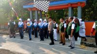 Peringati HUT RI Ke 78, Kapolsek Ngraho Berangkatkan 142 Regu Gerak Jalan
