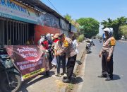 Sambut Maulid Nabi, Polsek Tanggulangin Berbagi Makanan Kepada Masyarakat