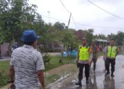 Kapolsek Sumberrejo Turun Langsung ke Lokasi Banjir, Pastikan Keamanan Warga