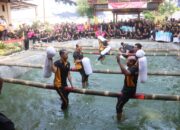 Sambut Hari Bhayangkara ke-79, Polres Bojonegoro Gelar Lomba Perang Guling