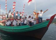 Ratusan Perahu Karnaval Mewarnai Perairan Selat Lembeh.