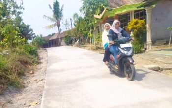Jalan Mulus Senyum Mengembang: TMMD 129 Bojonegoro Sulap Jalan Rusak Dusun Kedungpandan Jadi Cor Beton