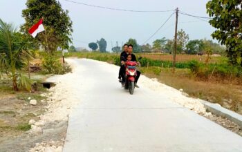 Akses Mulus, Ekonomi Terakselerasi: Jalan Cor Beton TMMD 129 Bojonegoro di Kedungpandan Tuntas 100 Persen