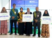 Serahkan Santunan Harpelnas, Wabup Nurul Azizah Tegaskan Komitmen Perlindungan Pekerja Rentan